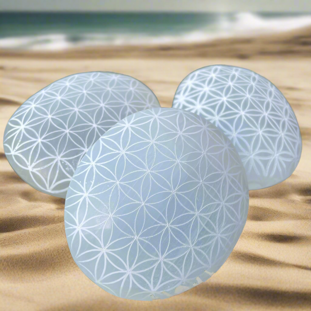 The Goddess’s Crystal: Flower of Life Selenite palm stone